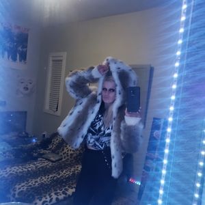 BomberFaux fur animal print jacket with hood